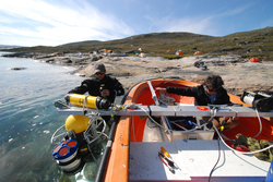 Jeff Pietro and Fiamma Straneo preparing a mooring in Greenland.