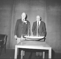 RV Atlantis model being presented to Charles Adams.