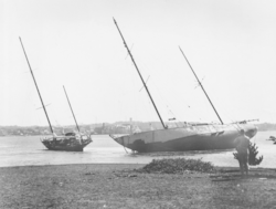 USS Saluda and Atlantis resting on Ram Island flats after 1944 Great Atlantic Hurricane.