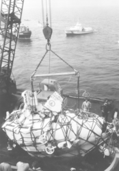 Alvin being lifted aboard a barge after its recovery in 1968.
