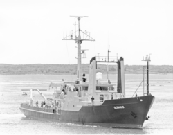 R/V Oceanus prior to refit, arriving at the WHOI dock.