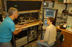 Heidi Sosik and Rob Olson working in the lab.