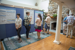 Several current students presented posters to alumni in the Fenno atrium.