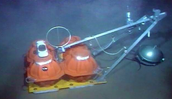 Ocean bottom seismograph in place on the seafloor.
