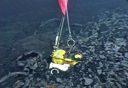 Ocean-Bottom Seismometer (OBS) buried and awaiting rescue.