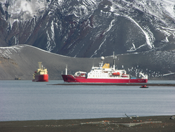 R/V Laurence M. Gould and the James Clark Ross anchored off Antarctica.