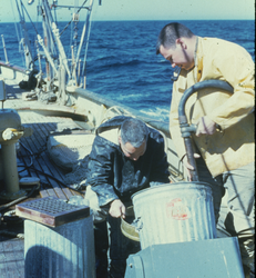 Howard Sanders (left) and George Hampson working on deck of Atlantis