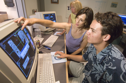 Anne Cohen and SSF Nicholas Jachowski working in CT scan lab.