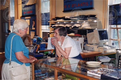Helene Longyear working at the Exhibit Center gift shop.