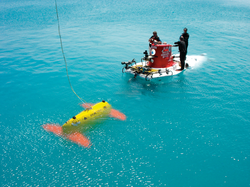 AUV Sentry and DSV Alvin at the surface of the water together.