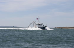 R/V Tioga underway through Great Harbor for its first arrival at WHOI.