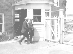 Employees and Trustees leaving through the wartime gate at Bigelow Laboratory.