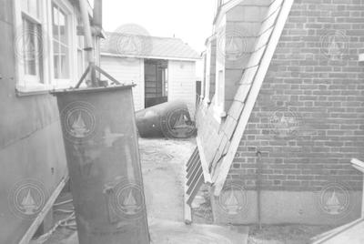 Damage to buildings and tanks from Hurricane Carol