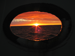 Sunrise in the Bay of Fundy from the Oceanus's bow.