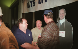 Bob Greene and Jay Murphy shaking hands with Bob Ballard.