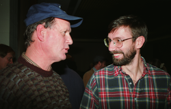 Jon Howland (right) talking with Bob Ballard at Bob's retirement party.