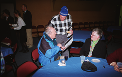 Elazar Uchupi and Linda Lucier talking to another guest at Ballard's retirement party.