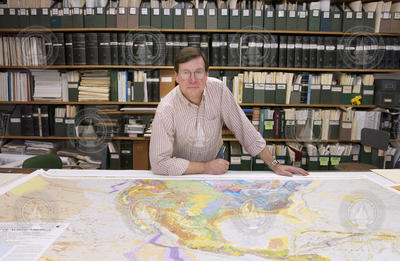 Brian Tucholke with the new geologic map of the seafloor that uses some of his data.