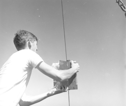 John Waterbury with Neskin-Baxter sampler on hydro wire