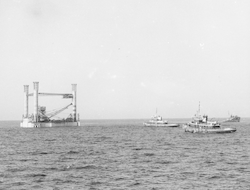 Construction of Texas Tower #4, tugs in view