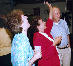 Hannah Stephens, Carolyn Winn and Bill Dunkle at Winn's party.