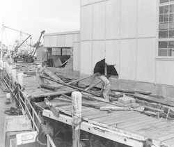 Damage to dock area after Hurricane Carol